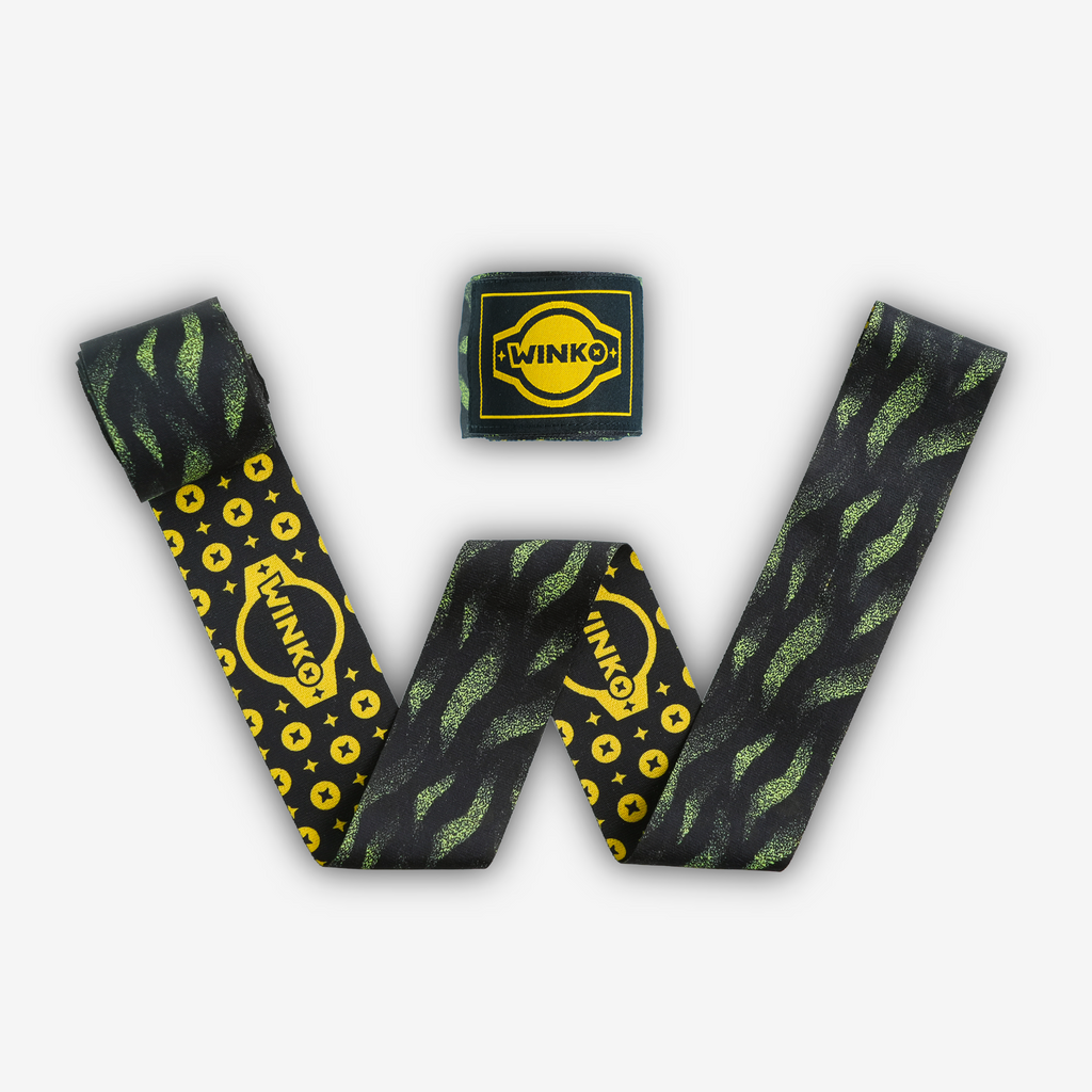 Two hand-wraps showing that are printed on both sides. one side has green flames on black background, reverse side shows pattern of yellow WINKO logo on black background.

Engineered to deliver optimal support and protection. The dual-sided sublimation print offers two style options: wrap either way for a different look.

Thin profile and smooth-touch surface
Lightly elastic blend
Lightweight
Integrated thumb loop, Velcro strap
